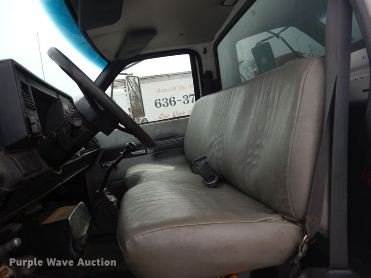 image for item DH5093 1999 GMC C6500 chip bed truck