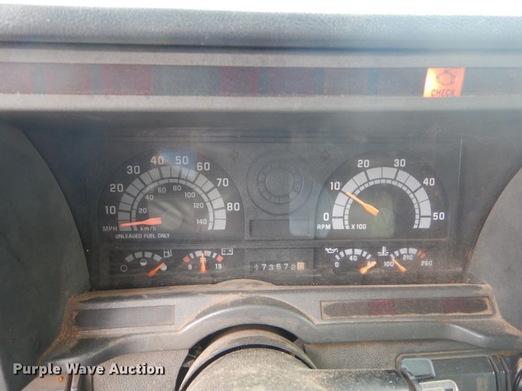 image for item DH5093 1999 GMC C6500 chip bed truck