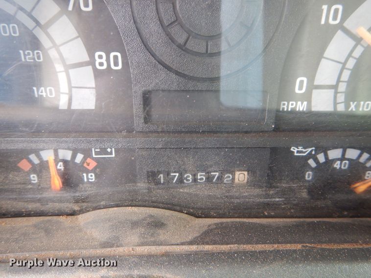 image for item DH5093 1999 GMC C6500 chip bed truck