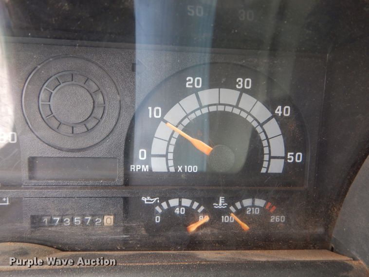 image for item DH5093 1999 GMC C6500 chip bed truck