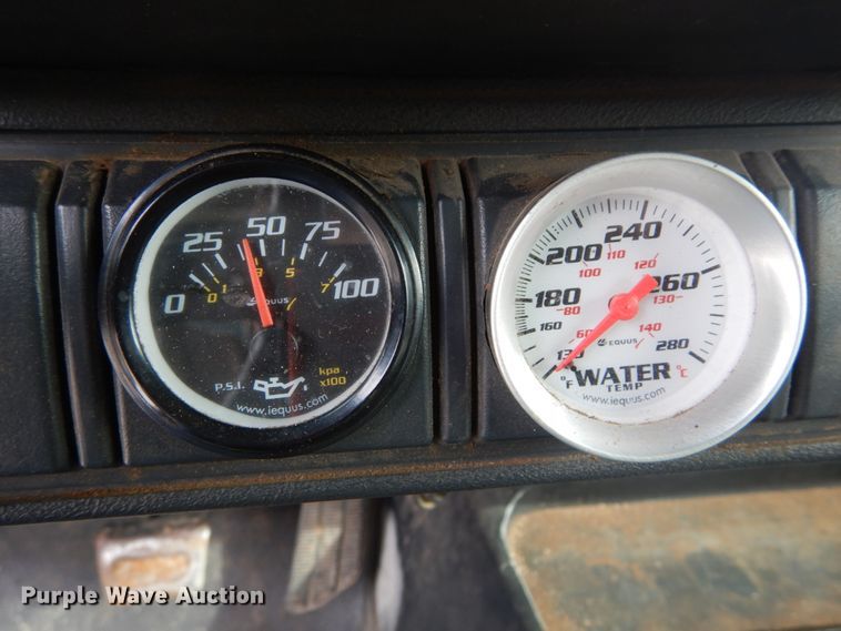 image for item DH5093 1999 GMC C6500 chip bed truck