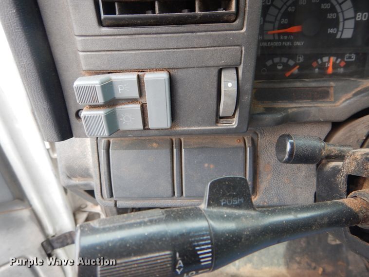 image for item DH5093 1999 GMC C6500 chip bed truck