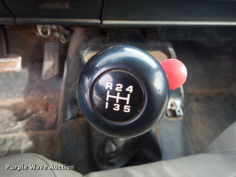 image for item DH5093 1999 GMC C6500 chip bed truck