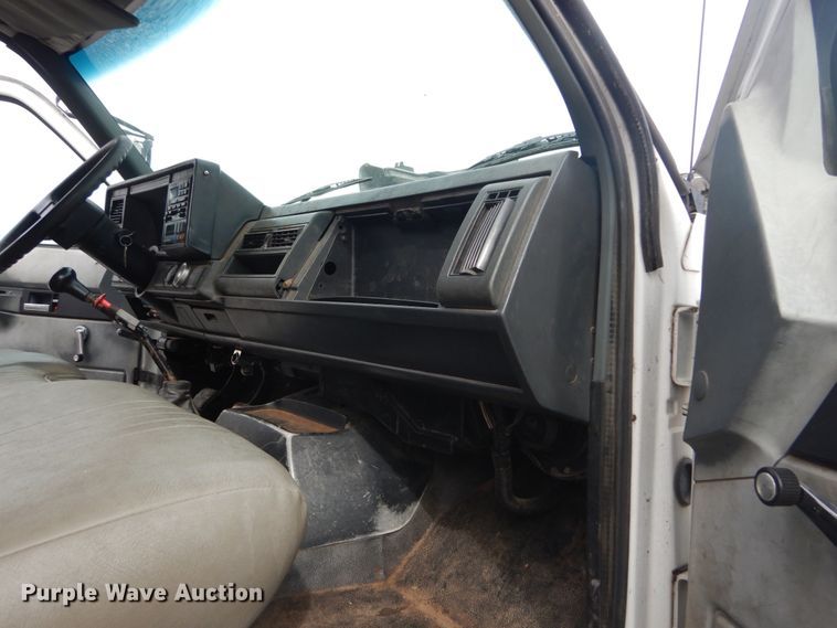 image for item DH5093 1999 GMC C6500 chip bed truck