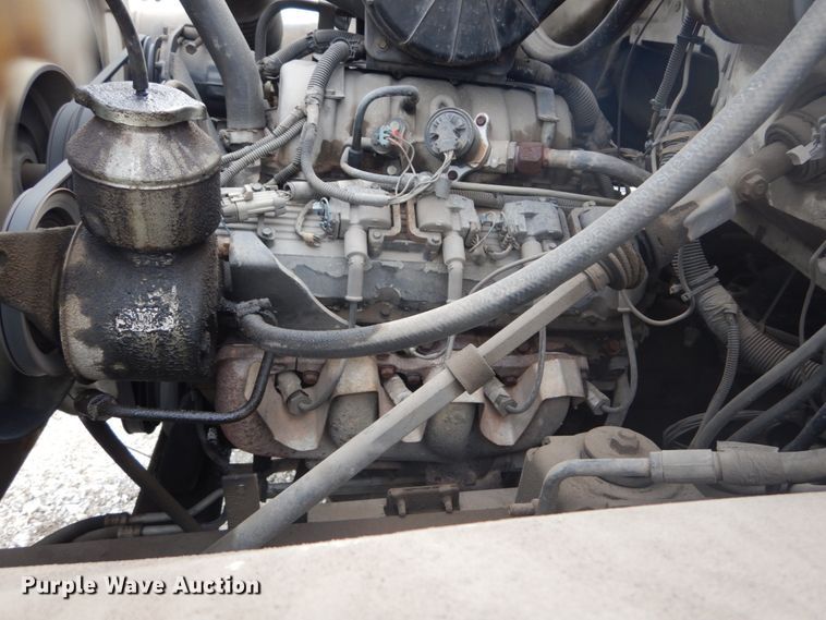 image for item DH5093 1999 GMC C6500 chip bed truck