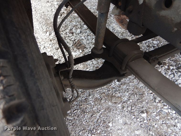 image for item DH5093 1999 GMC C6500 chip bed truck