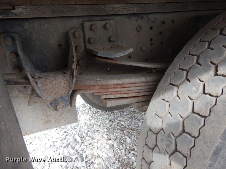 image for item DH5093 1999 GMC C6500 chip bed truck