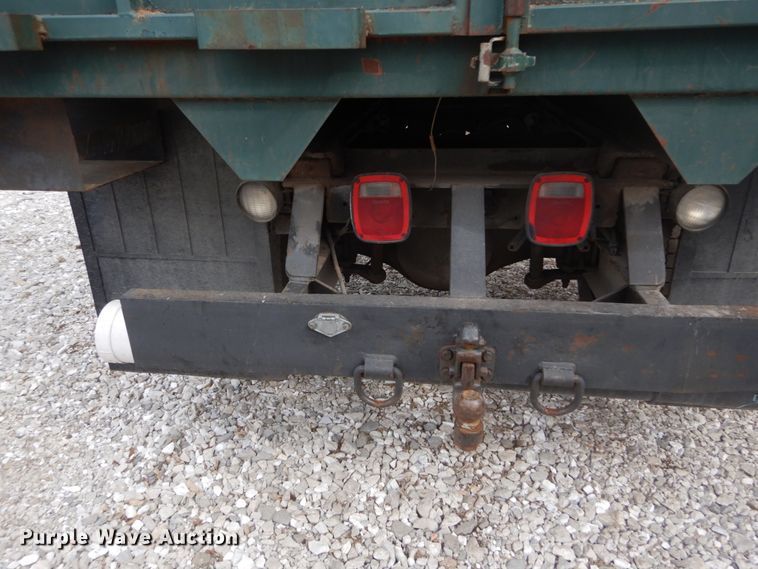 image for item DH5093 1999 GMC C6500 chip bed truck