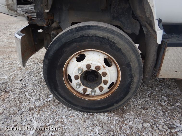 image for item DH5093 1999 GMC C6500 chip bed truck