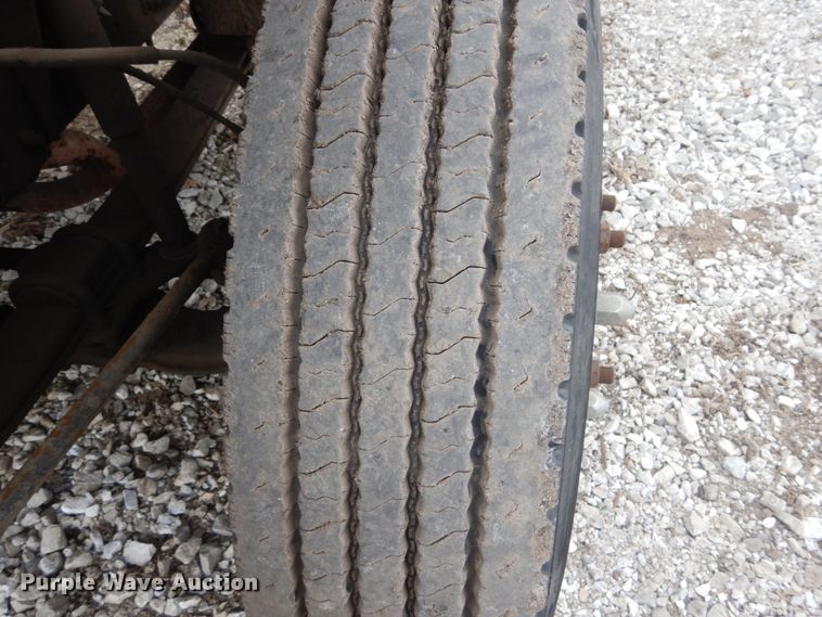 image for item DH5093 1999 GMC C6500 chip bed truck