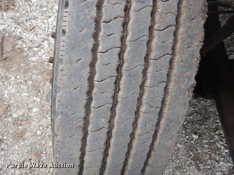 image for item DH5093 1999 GMC C6500 chip bed truck