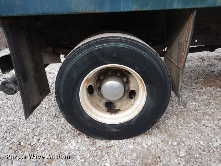 image for item DH5093 1999 GMC C6500 chip bed truck