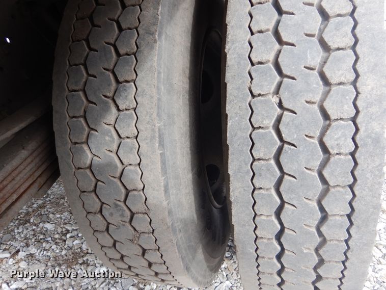 image for item DH5093 1999 GMC C6500 chip bed truck