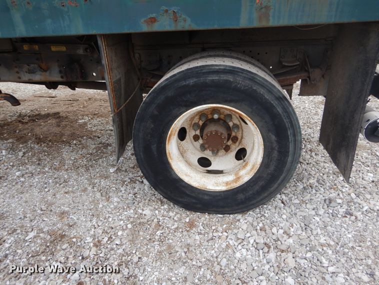 image for item DH5093 1999 GMC C6500 chip bed truck