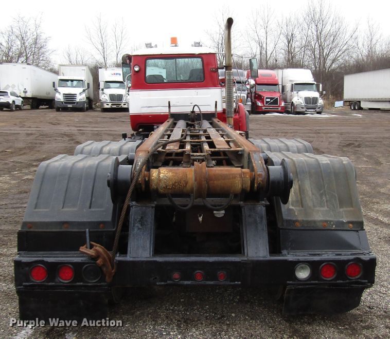 image for item DH8453 1999 Mack DM600 roll-off container truck