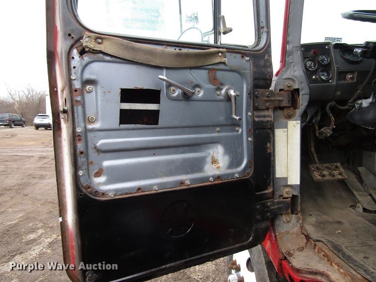 image for item DH8453 1999 Mack DM600 roll-off container truck