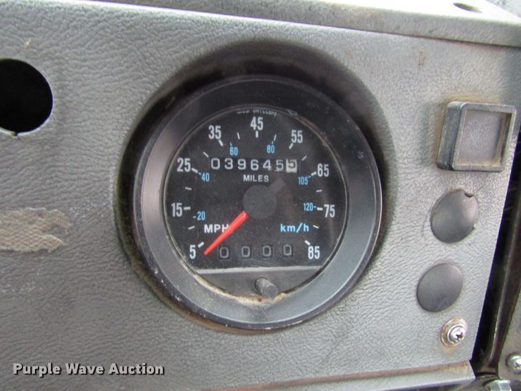 image for item DH8453 1999 Mack DM600 roll-off container truck