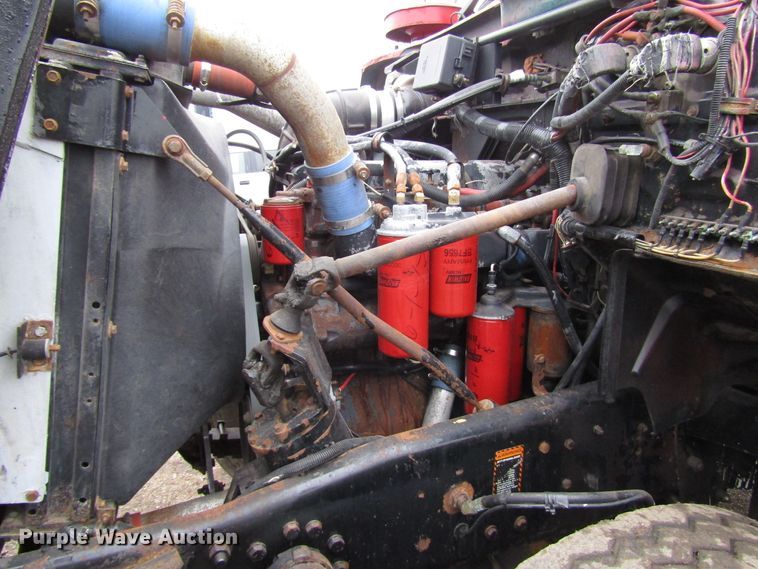 image for item DH8453 1999 Mack DM600 roll-off container truck