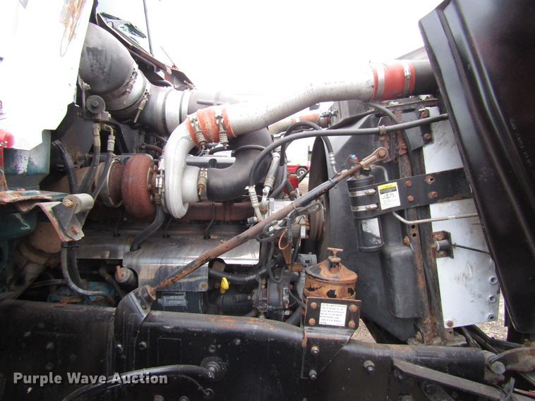 image for item DH8453 1999 Mack DM600 roll-off container truck