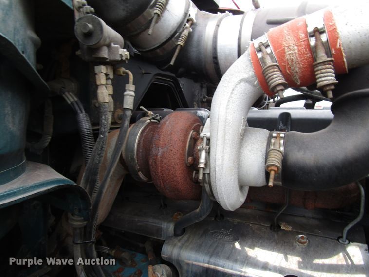 image for item DH8453 1999 Mack DM600 roll-off container truck