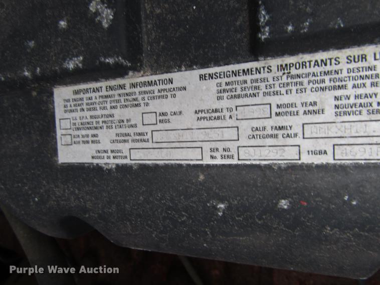 image for item DH8453 1999 Mack DM600 roll-off container truck