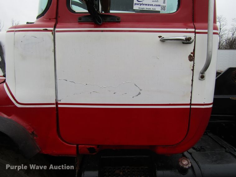 image for item DH8453 1999 Mack DM600 roll-off container truck