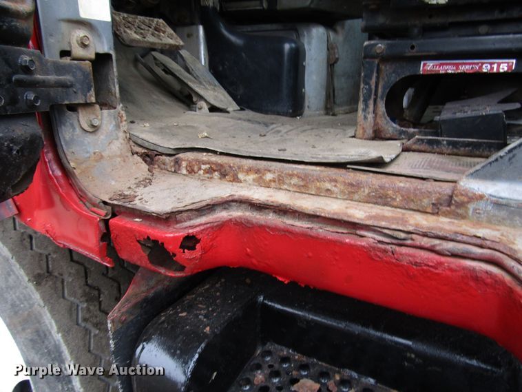 image for item DH8453 1999 Mack DM600 roll-off container truck