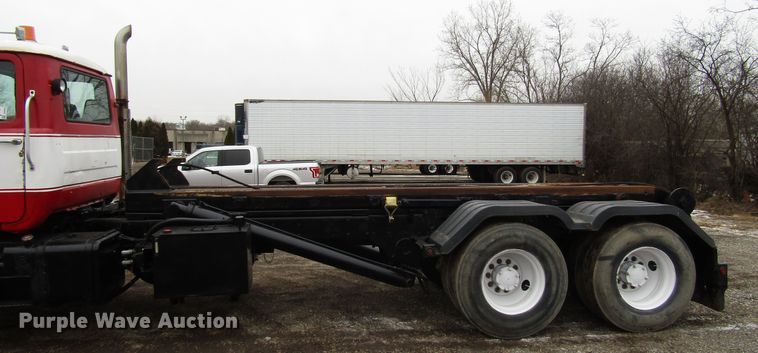 image for item DH8453 1999 Mack DM600 roll-off container truck