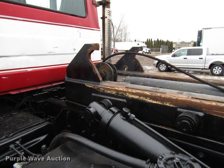 image for item DH8453 1999 Mack DM600 roll-off container truck