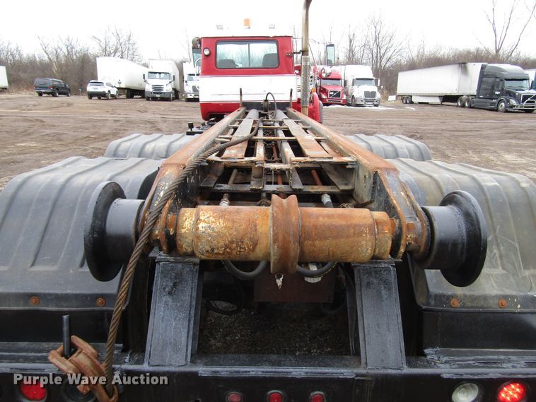 image for item DH8453 1999 Mack DM600 roll-off container truck