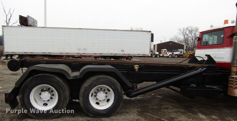 image for item DH8453 1999 Mack DM600 roll-off container truck