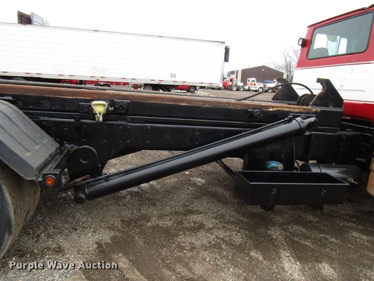 image for item DH8453 1999 Mack DM600 roll-off container truck