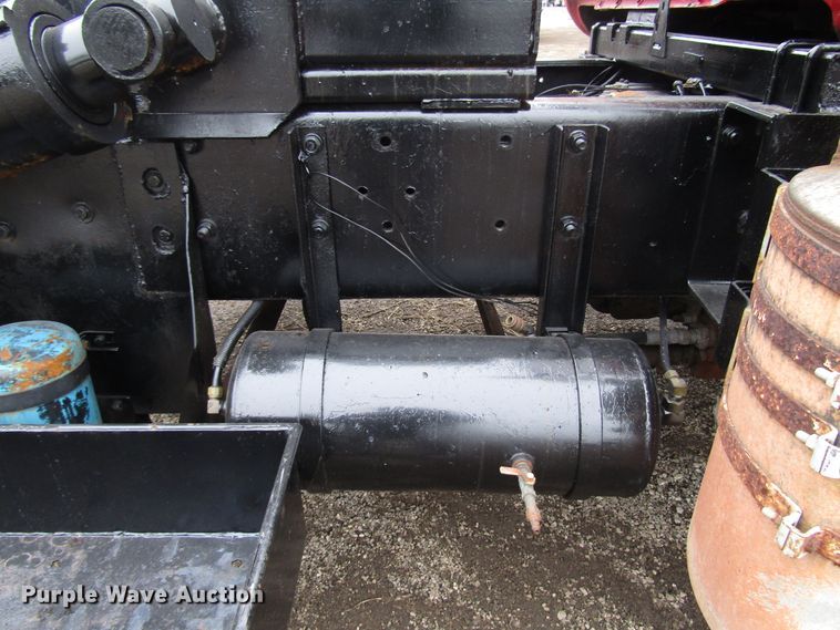 image for item DH8453 1999 Mack DM600 roll-off container truck