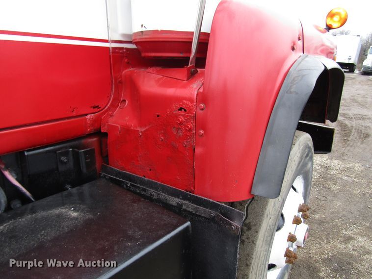 image for item DH8453 1999 Mack DM600 roll-off container truck