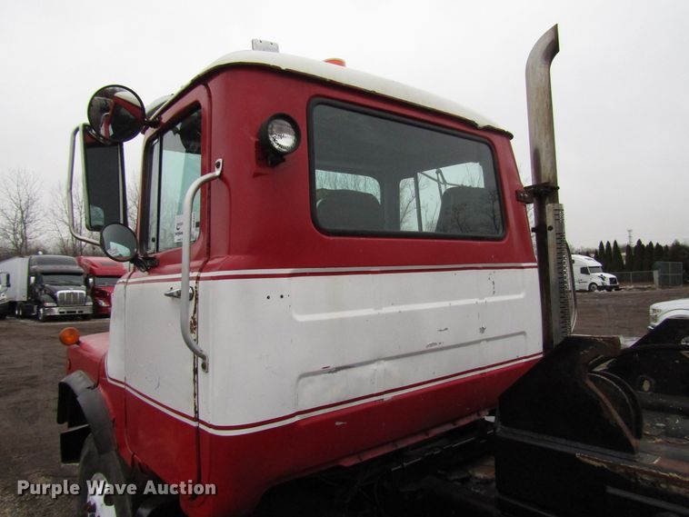 image for item DH8453 1999 Mack DM600 roll-off container truck