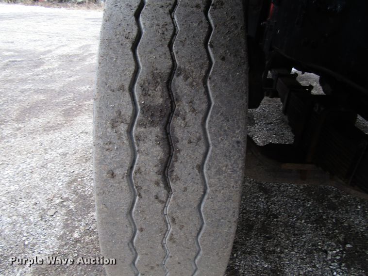 image for item DH8453 1999 Mack DM600 roll-off container truck