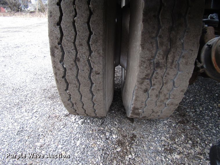 image for item DH8453 1999 Mack DM600 roll-off container truck