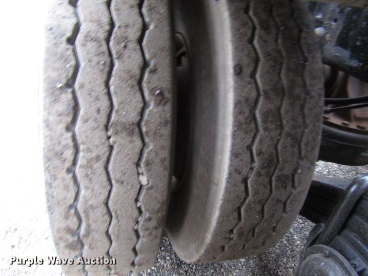 image for item DH8453 1999 Mack DM600 roll-off container truck