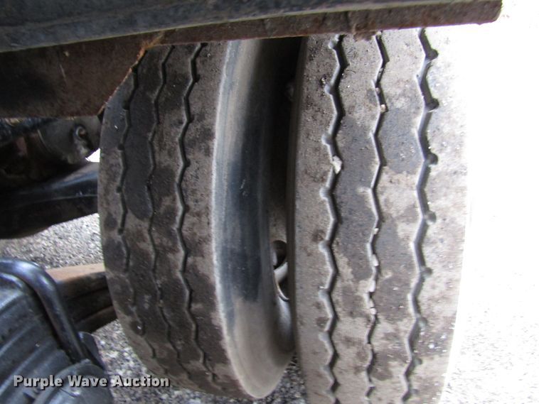 image for item DH8453 1999 Mack DM600 roll-off container truck