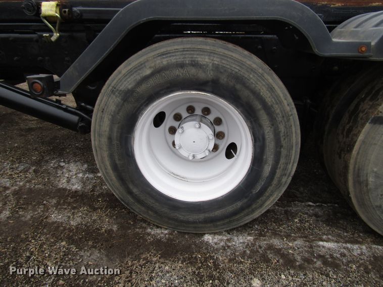 image for item DH8453 1999 Mack DM600 roll-off container truck