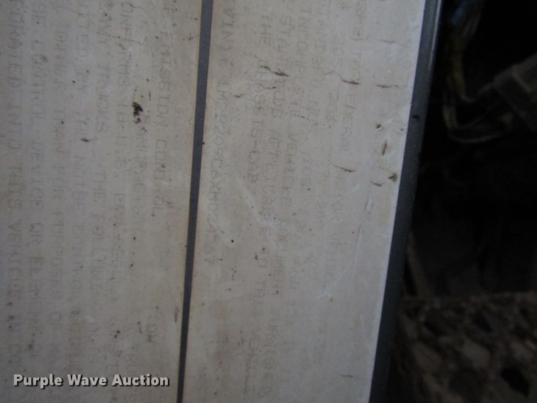 image for item DH8453 1999 Mack DM600 roll-off container truck