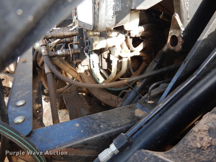 image for item DJ3009 2006 New Holland TV145 bi-directional 4WD tractor