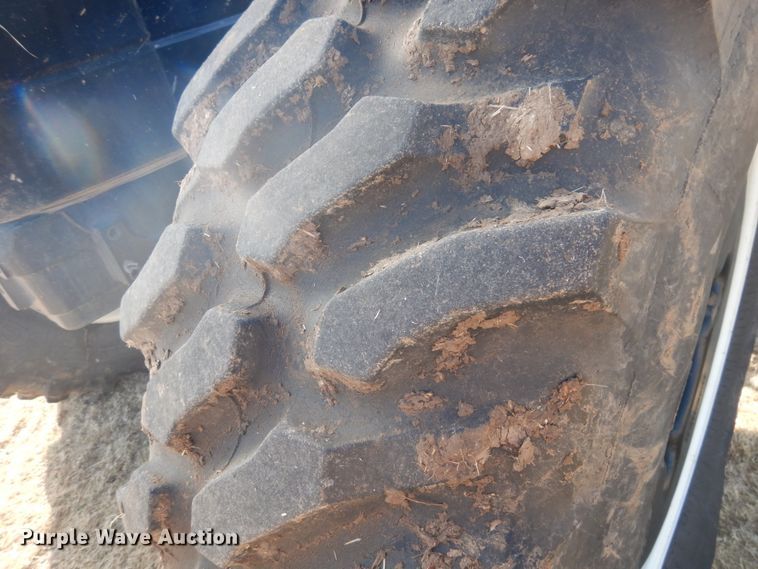 image for item DJ3009 2006 New Holland TV145 bi-directional 4WD tractor