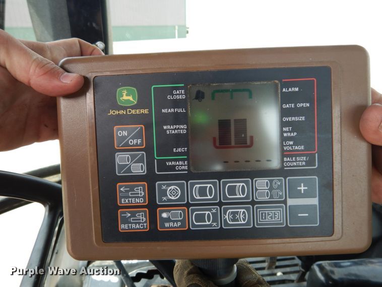 image for item DJ3018 2011 John Deere 568 round baler