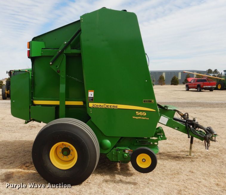 image for item DJ3019 2013 John Deere 569 Mega Wide Plus round baler