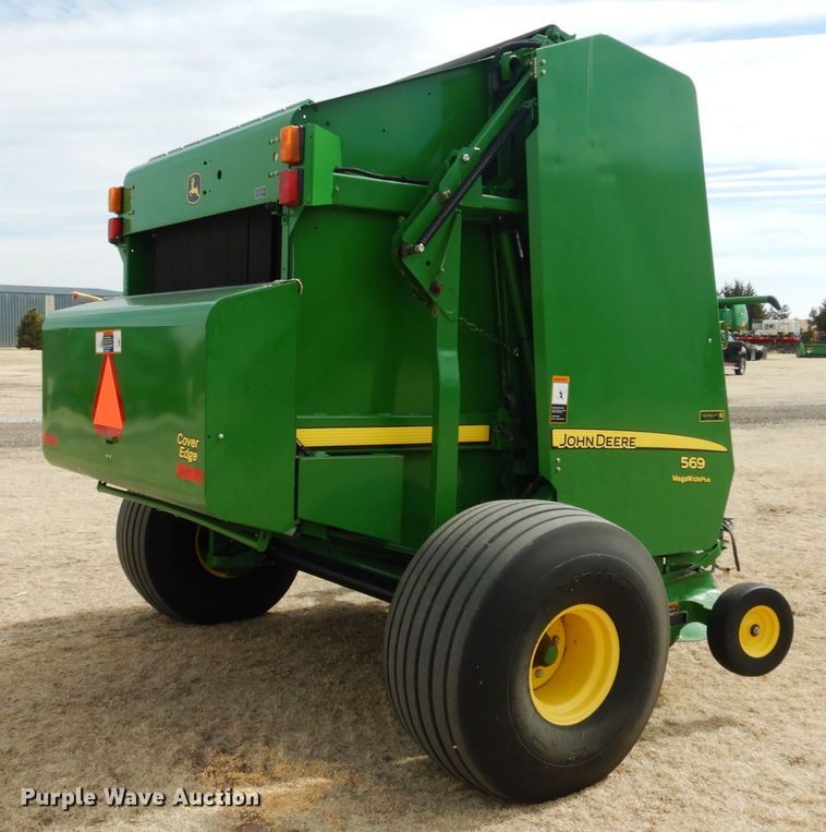 image for item DJ3019 2013 John Deere 569 Mega Wide Plus round baler