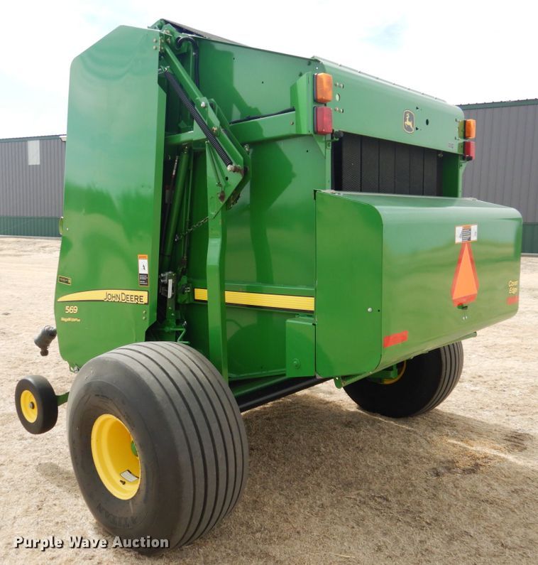 image for item DJ3019 2013 John Deere 569 Mega Wide Plus round baler