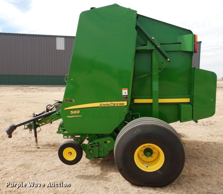 image for item DJ3019 2013 John Deere 569 Mega Wide Plus round baler