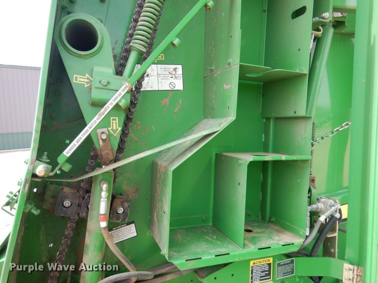 image for item DJ3019 2013 John Deere 569 Mega Wide Plus round baler
