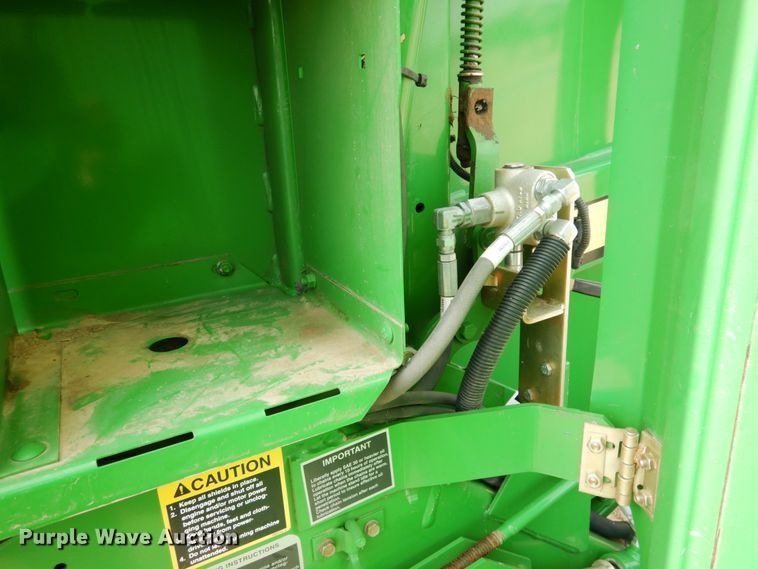 image for item DJ3019 2013 John Deere 569 Mega Wide Plus round baler